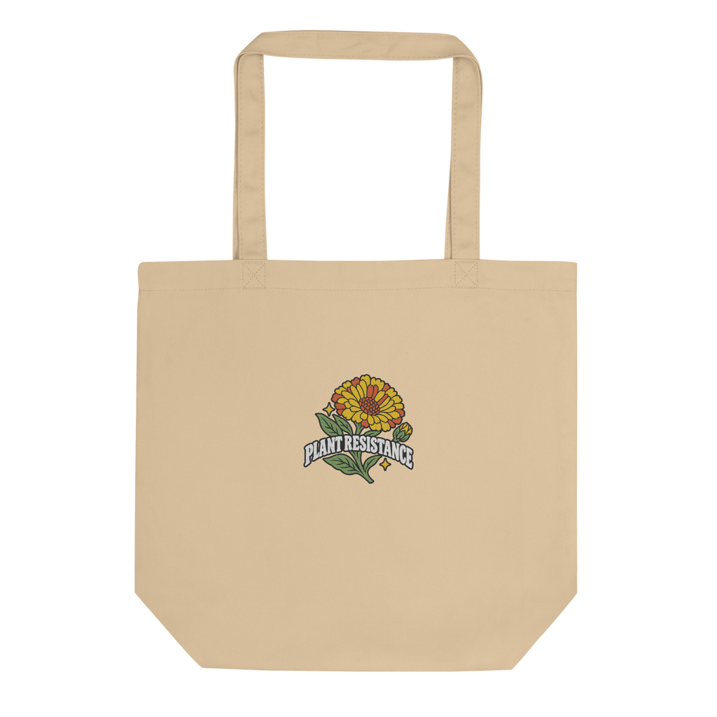 Stone organic cotton tote bag with embroidered Plant Resistance calendula design. Bio-Baumwolltasche mit gesticktem Plant Resistance Ringelblumen-Design.